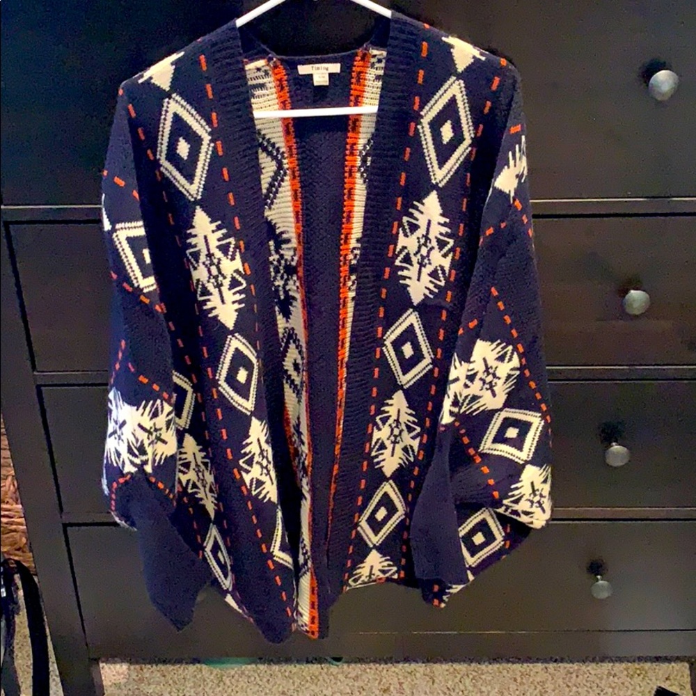 navy blue/cream/rust color cardigan. worn 4x.